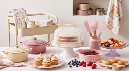 Collection of pink and cream coloured IKEA bakware in kitchen
