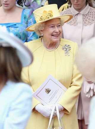 Yellow, Headgear, Fun, Tradition, Hat, Fashion accessory, Event, Costume hat, Smile, Costume,