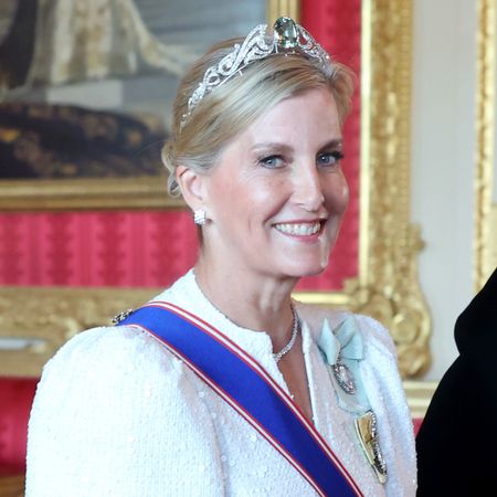 Duchess Sophie wearing a white dress and diamond tiara smiling 
