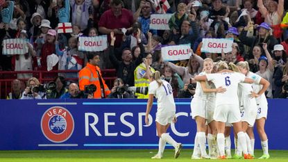Fran Kirby of England celebrates after scoring her team's fourth goal with teammates during the UEFA Women's Euro 2022 Semi Final match between England and Sweden at Bramall Lane on July 26, 2022 in Sheffield, United Kingdom.
