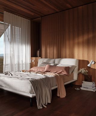 how to make a bedroom darker, dark bedroom ideas, modern bedroom with wood panelling, cream bed, wall lights, hardwood floor, voile curtain