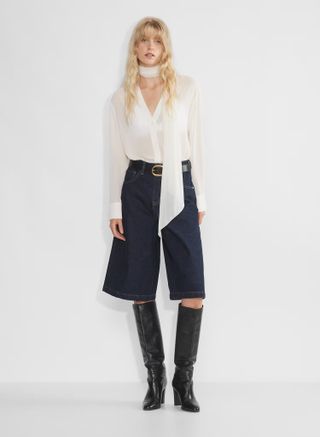 Aritzia Snapshot Below-Knee Denim Short in Dark Blue