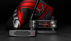 The Scotty Cameron Studio Xperimental Limited Putters on a black background