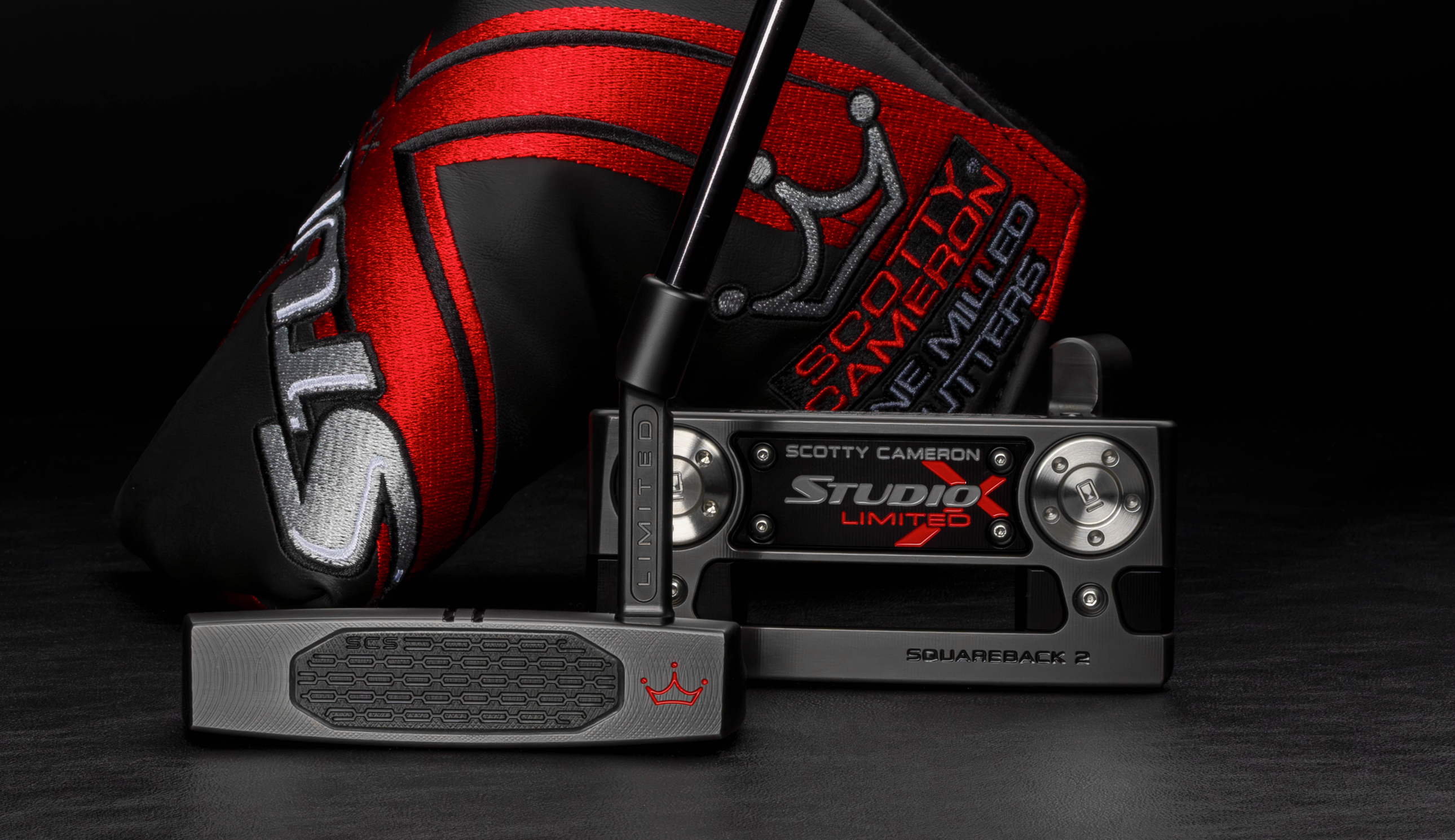 The Scotty Cameron Studio Xperimental Limited Putters on a black background