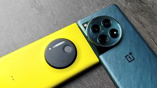 A yellow Lumia 1020 next to the OnePlus 12