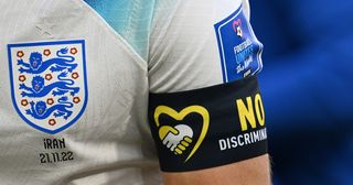 Detail of the No Discrimination captain's armband of Harry Kane of England during the FIFA World Cup Qatar 2022 Group B match between England and IR Iran at Khalifa International Stadium on November 21, 2022 in Doha, Qatar.