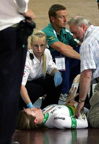 Kerrie Meares gets assistance after crashing-out