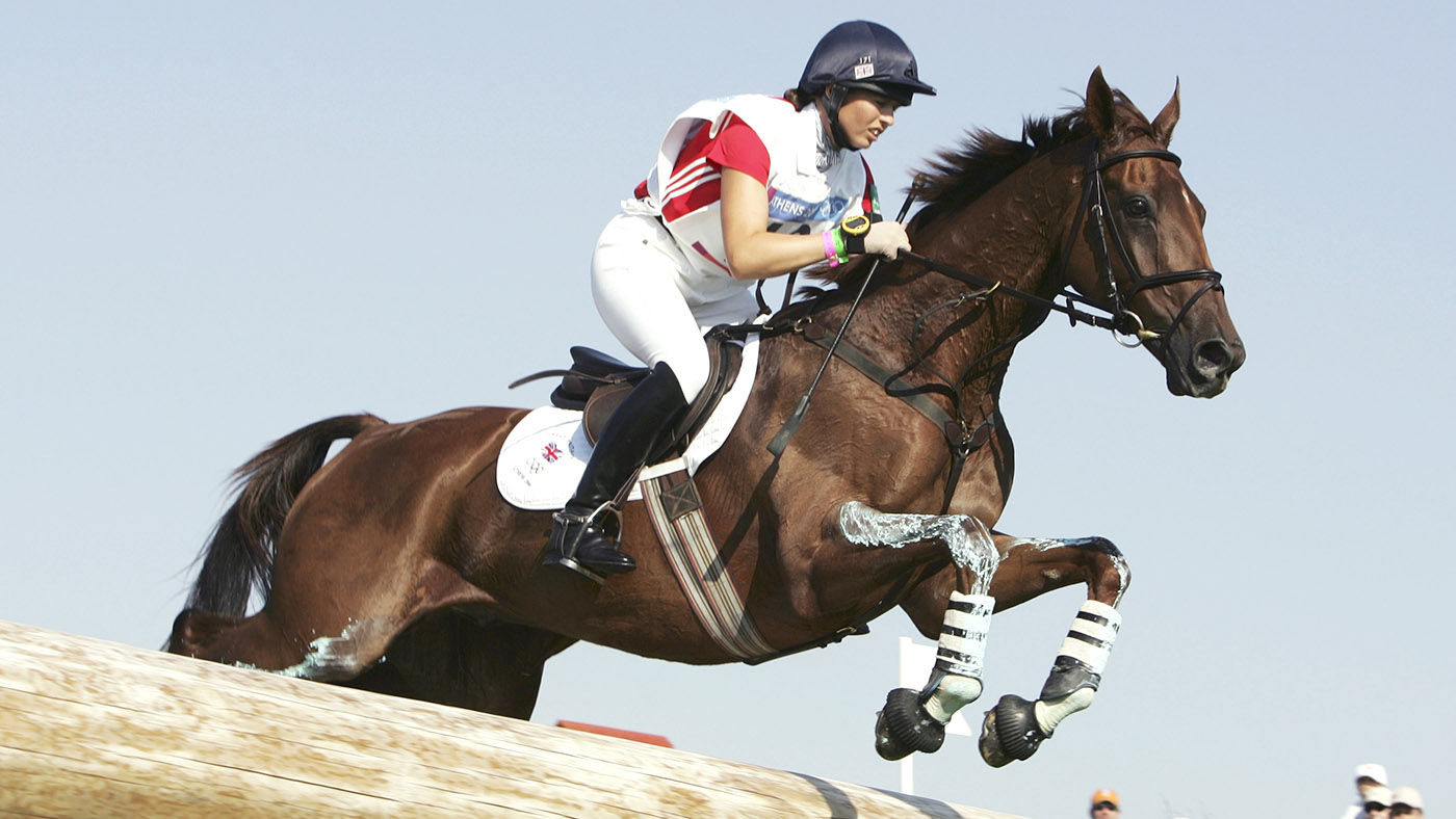 ATHENS - AUGUST 17: Jeanette Brakewell of Great Britain competes on Over To You in the eventing cross country competition on August 17, 2004 during the Athens 2004 Summer Olympic Games at the Markopoulo Olympic Equestrian Centre Eventing Park in Athens, Greece. (Photo by Clive Mason/Getty Images)