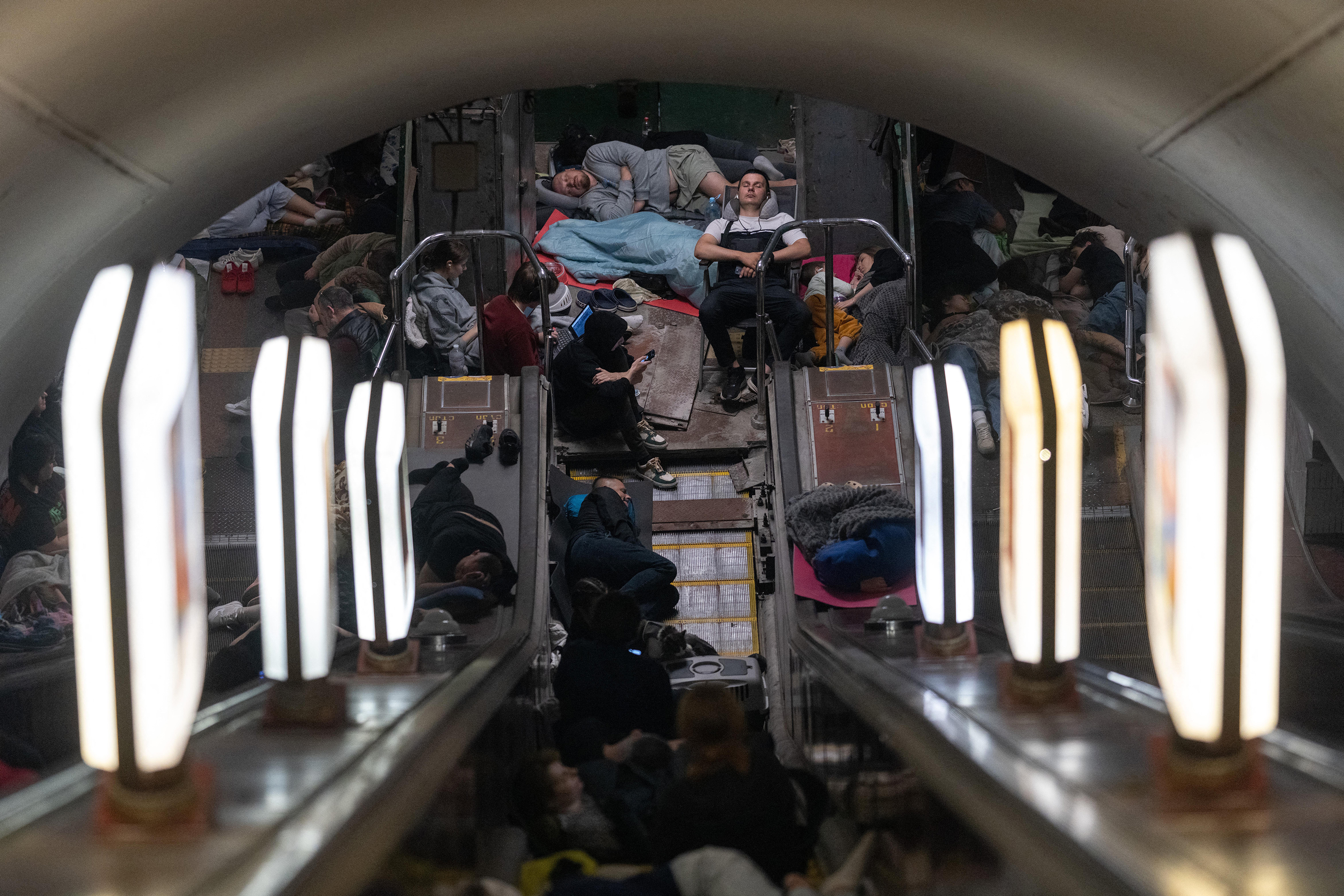 TOPSHOT - People take shelter at a metro station during Russian missile strike on Kyiv, early on July 30, 2026, amid the Russian invasion of Ukraine. Russian strikes on Kyiv killed at least one person, authorities said on July 30, after Ukrainian President Volodymyr Zelensky warned of Moscow launching another massive attack overnight. (Photo by OLEKSII FILIPPOV / AFP via Getty Images)