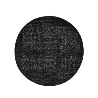 A black circular rug