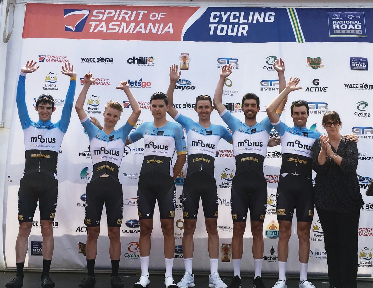 The mobius Future Racing riders celebrate on the Tour of Tasmania podium