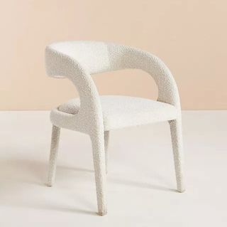 Boucle sculptural dining chair in ivory