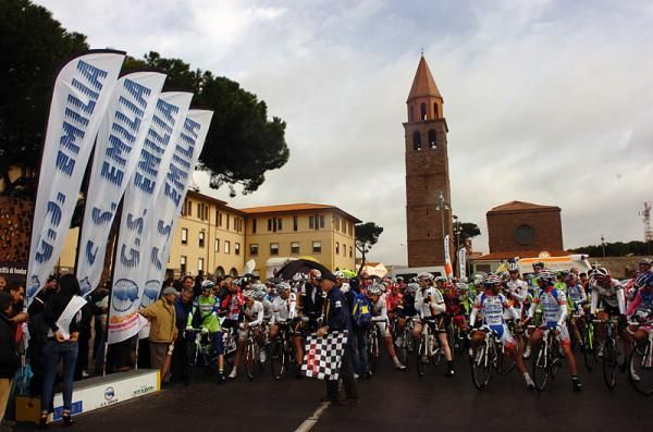 The peloton awaits the start of stage four in Carbonia.