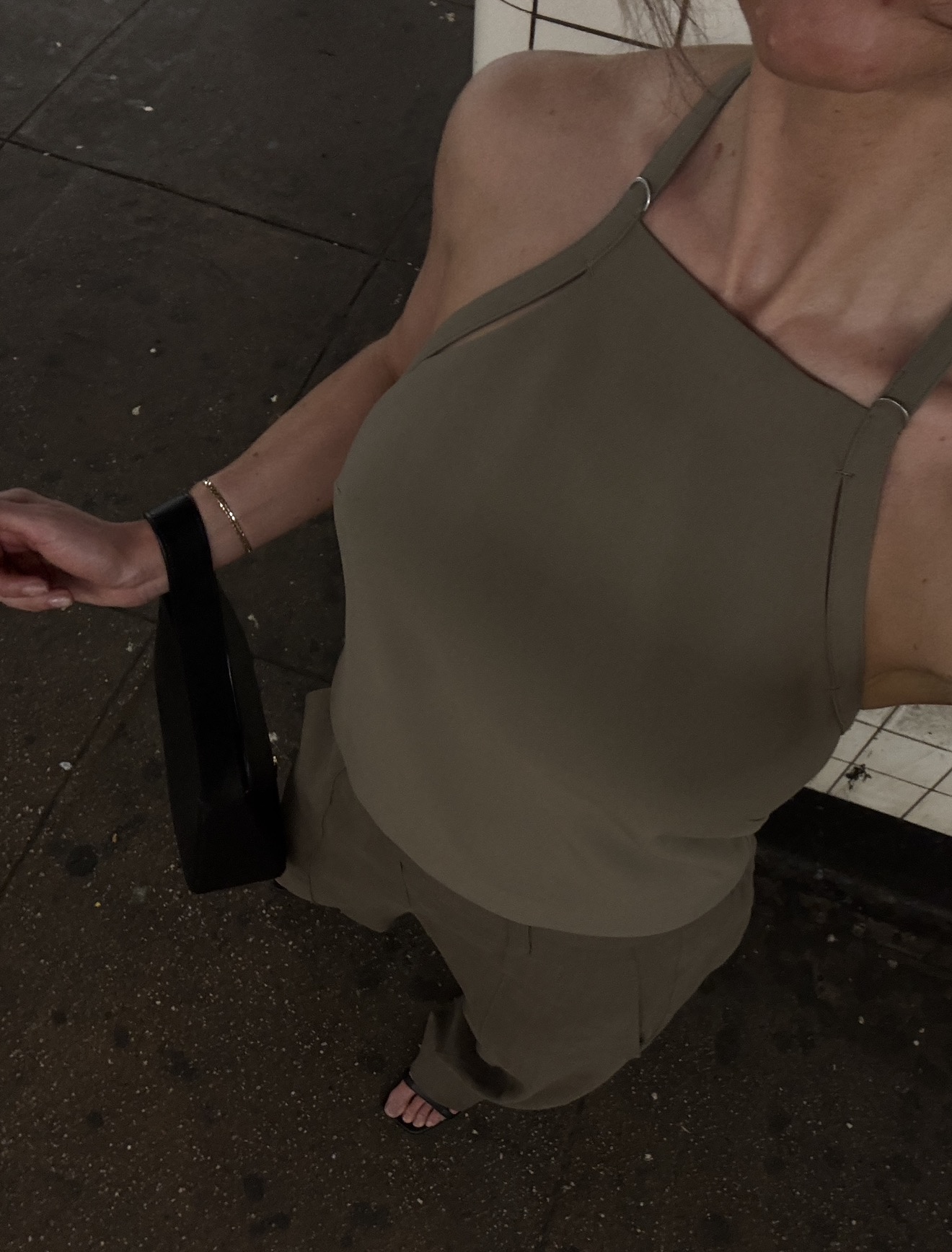 Kathryn Zahorak wearing green tank top and pants