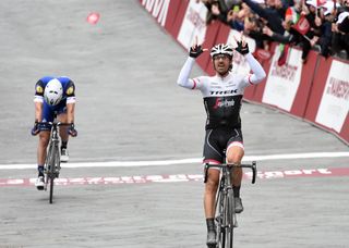 Fabian Cancellara celebrates his third victory in the Strade Bianche: the only rider to have won three editions of the race. Second-placed Zdenek Stybar, who won in 2015, dips his head after attempting to overhaul Cancellara on the final climb.
