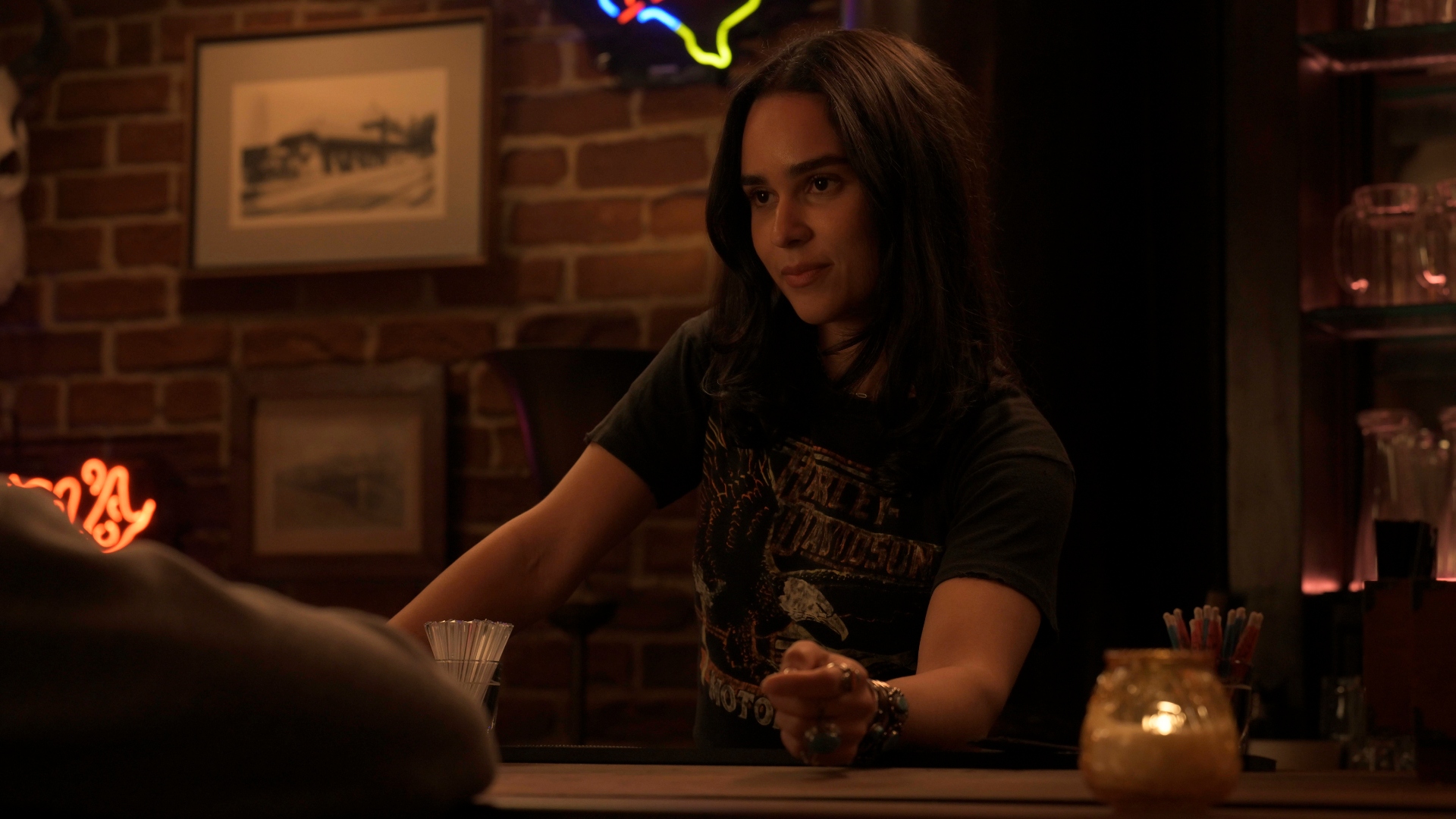 Ellie serves at the bar in Ransom Canyon season 1