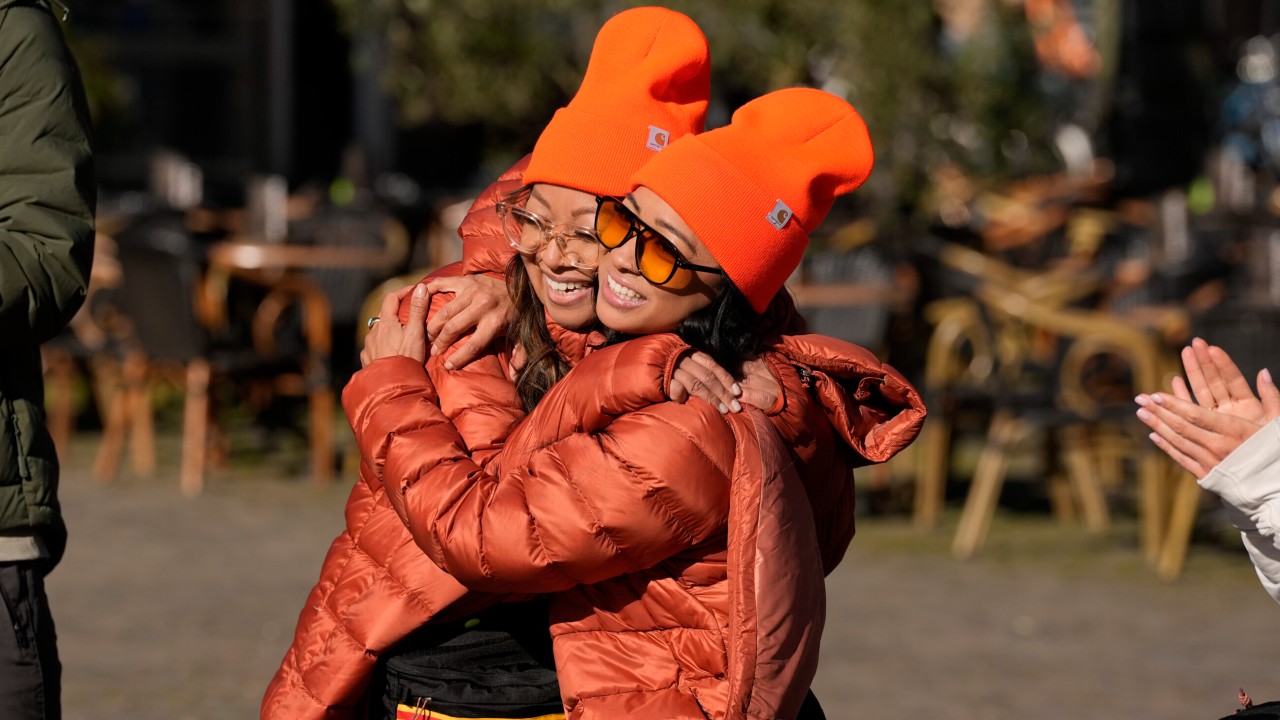 Rubina and Kristine hugging