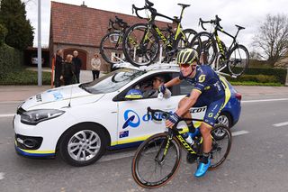 Alexander Edmondson at the Orica-Scott team car during stage 2 at Three days of De Panne