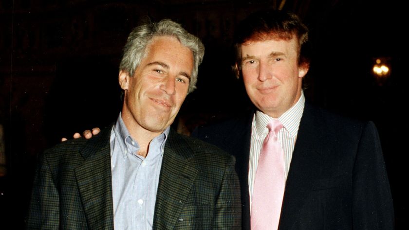 Jeffrey Epstein and Trump posing together at Mar a Lago in 1997