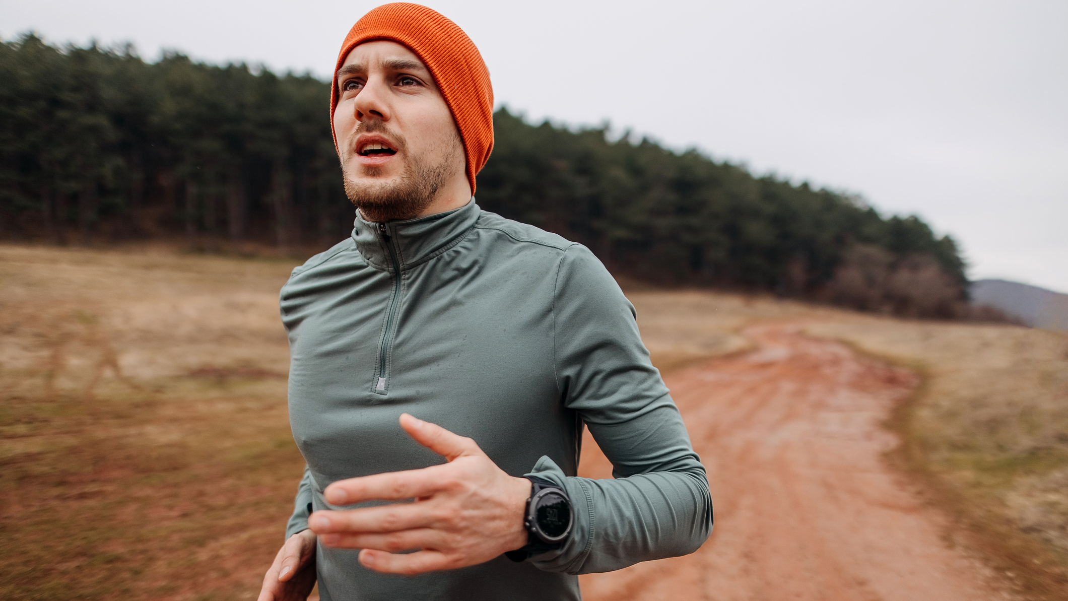 Man running with his sports watch