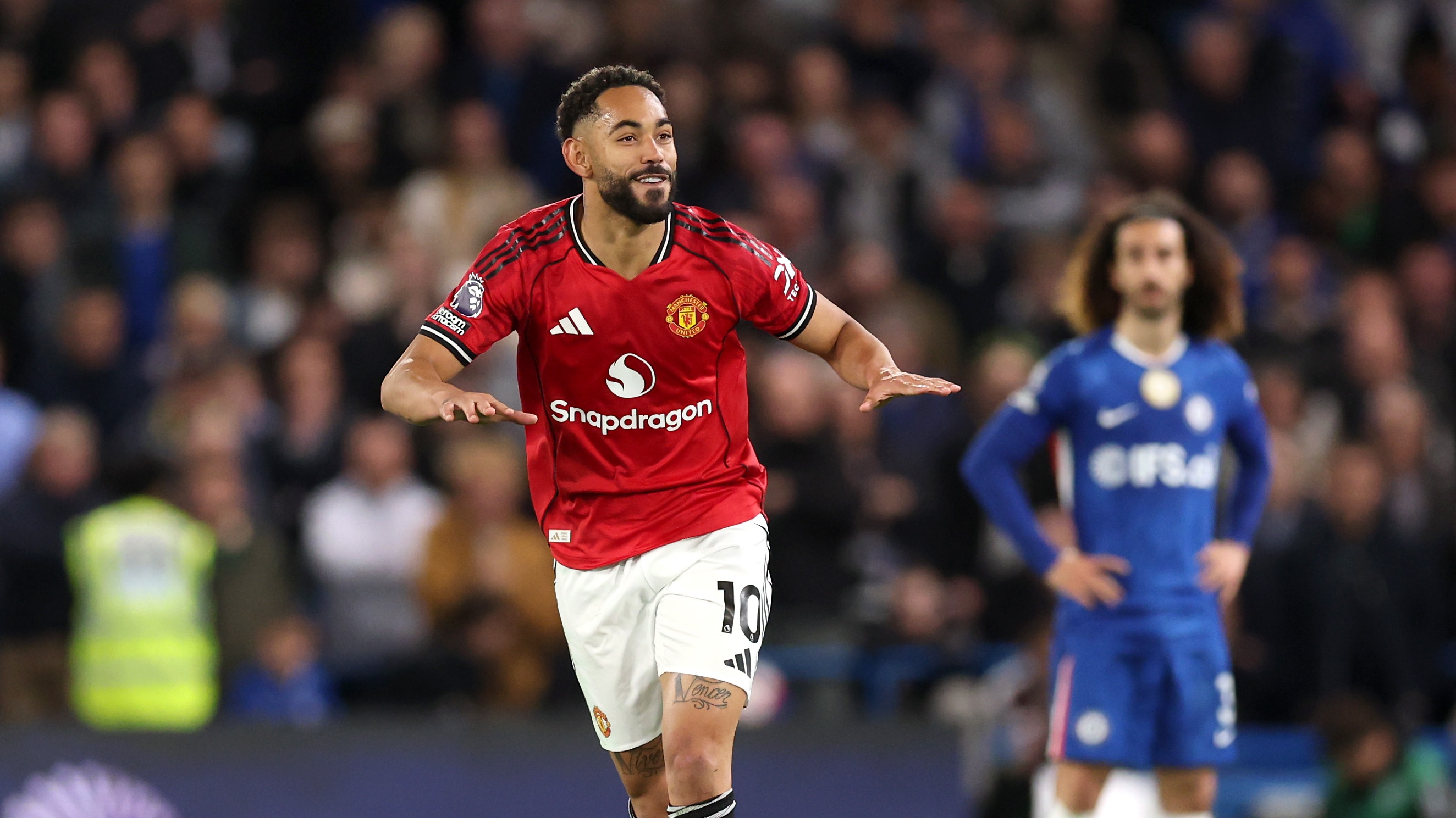 Matheus Cunha of Manchester United celebrates scoring his team's first goal during the Premier League match against Chelsea. 