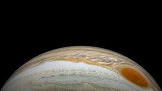 Jupiter's Great Red Spot and a stream of smaller Jovian storms swirl across the planet's south equatorial belt in this new view from NASA's Juno spacecraft. Citizen scientist Kevin Gill created this view using data collected by the spacecraft's JunoCam imager during a close flyby on July 21, 2019. At the time, Juno was about 26,697 miles (42,965 kilometers) above Jupiter's cloud tops.