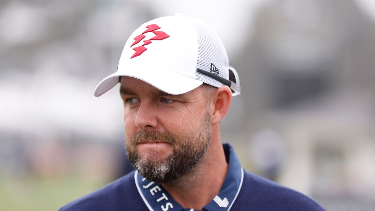 Marc Leishman wears a Ripper GC cap