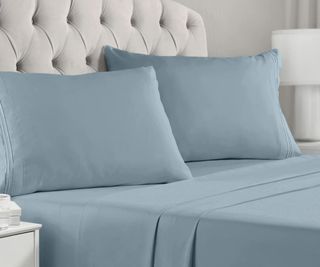 Mellanni Queen Sheet Set in blue against gray walls.