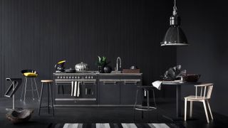 Dark black kitchen with pendant light