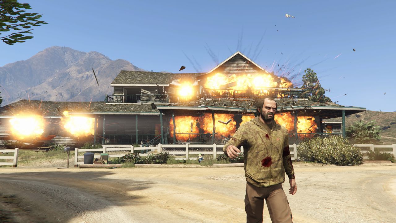 Trevor walks away from exploding house in GTA V