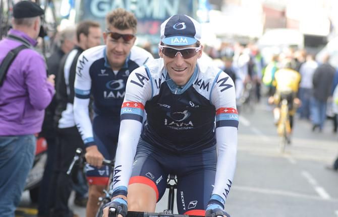 Martin Elmiger and Heinrich Haussler head to sign-in