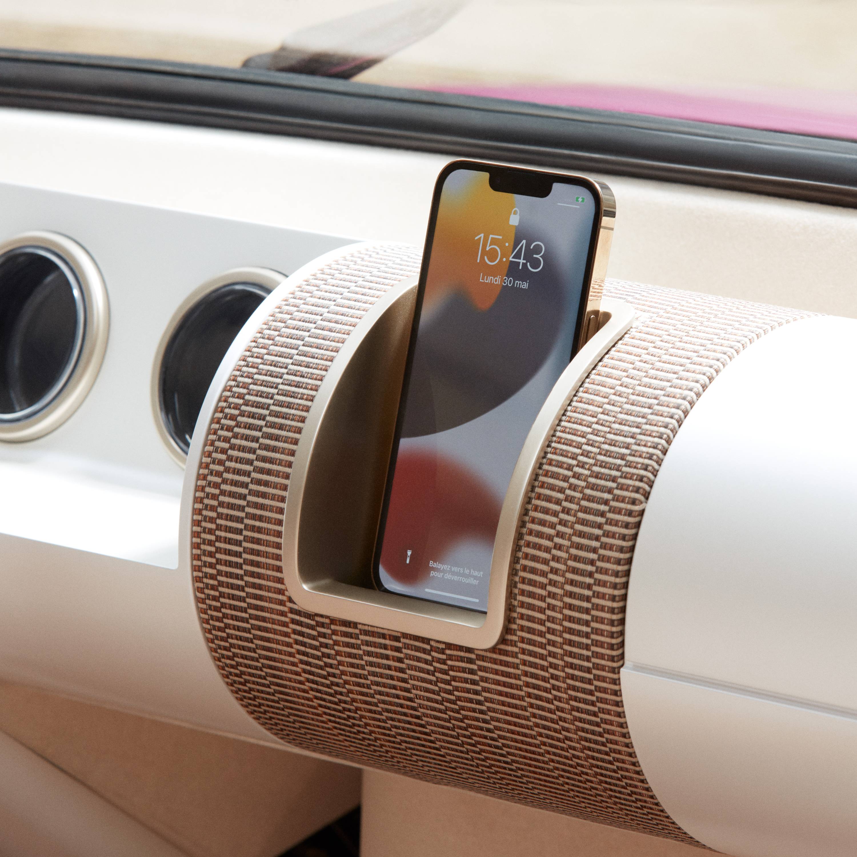 phone docked on car dashboard