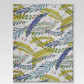 Green and blue print outdoor rug