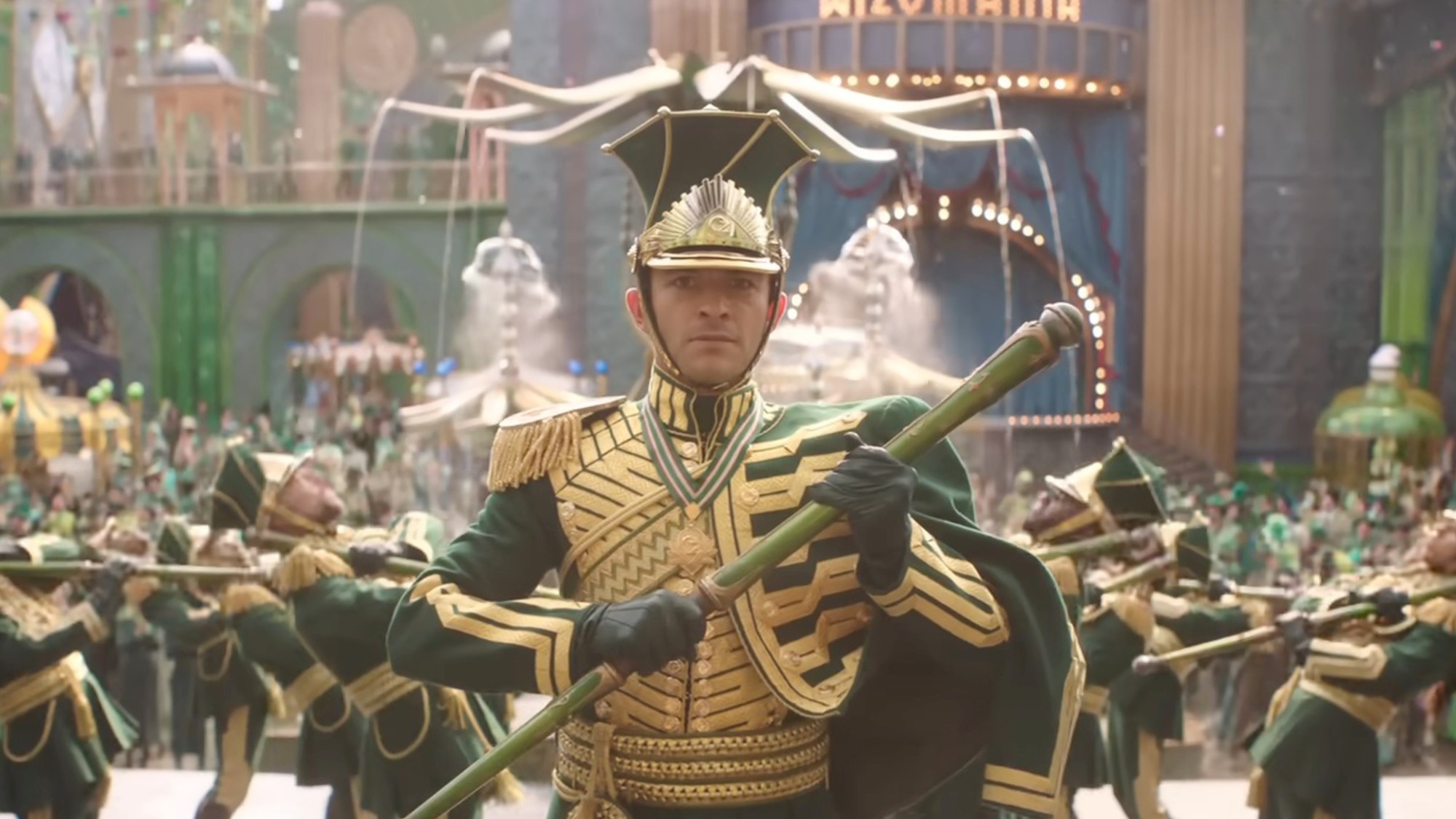 Jonathan Bailey decked out in green and yellow in Wicked: For Good