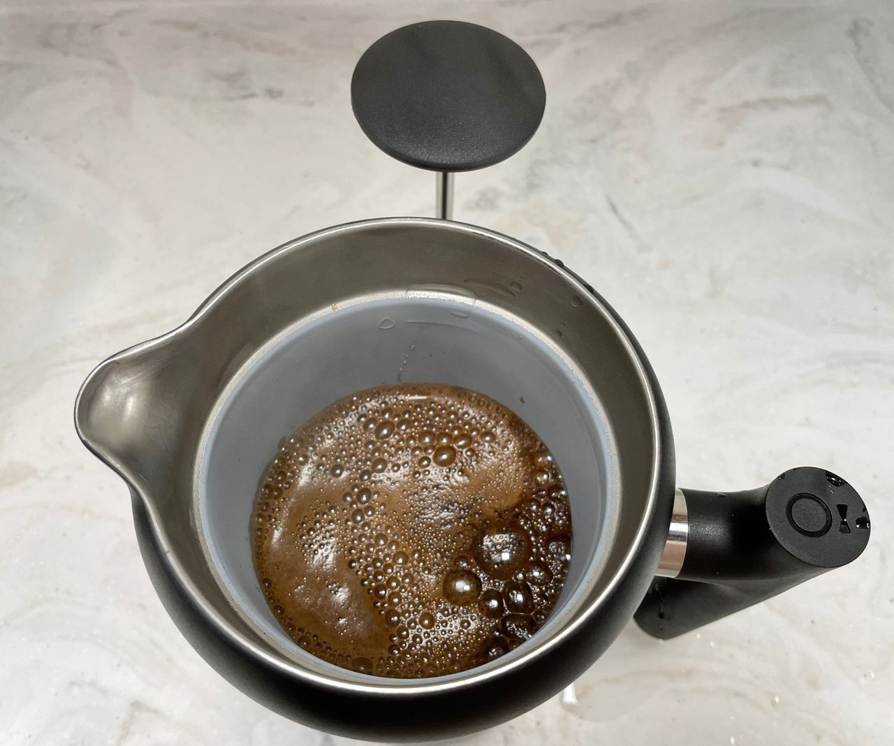 Fellow Clara French Press, from above, brewing coffee