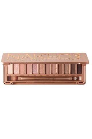 Urban Decay Naked3 Eyeshadow Palette open on a white background