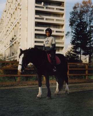 Gucci London Book Image of Girl on Horse by Housing Block