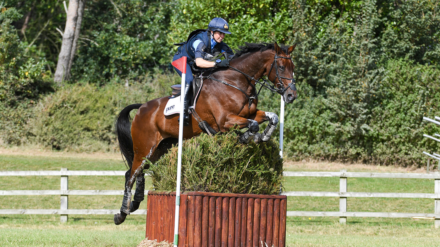 Vittoria Panizzon's ride Chequers Play The Game sports a hunting style eventing breastplate