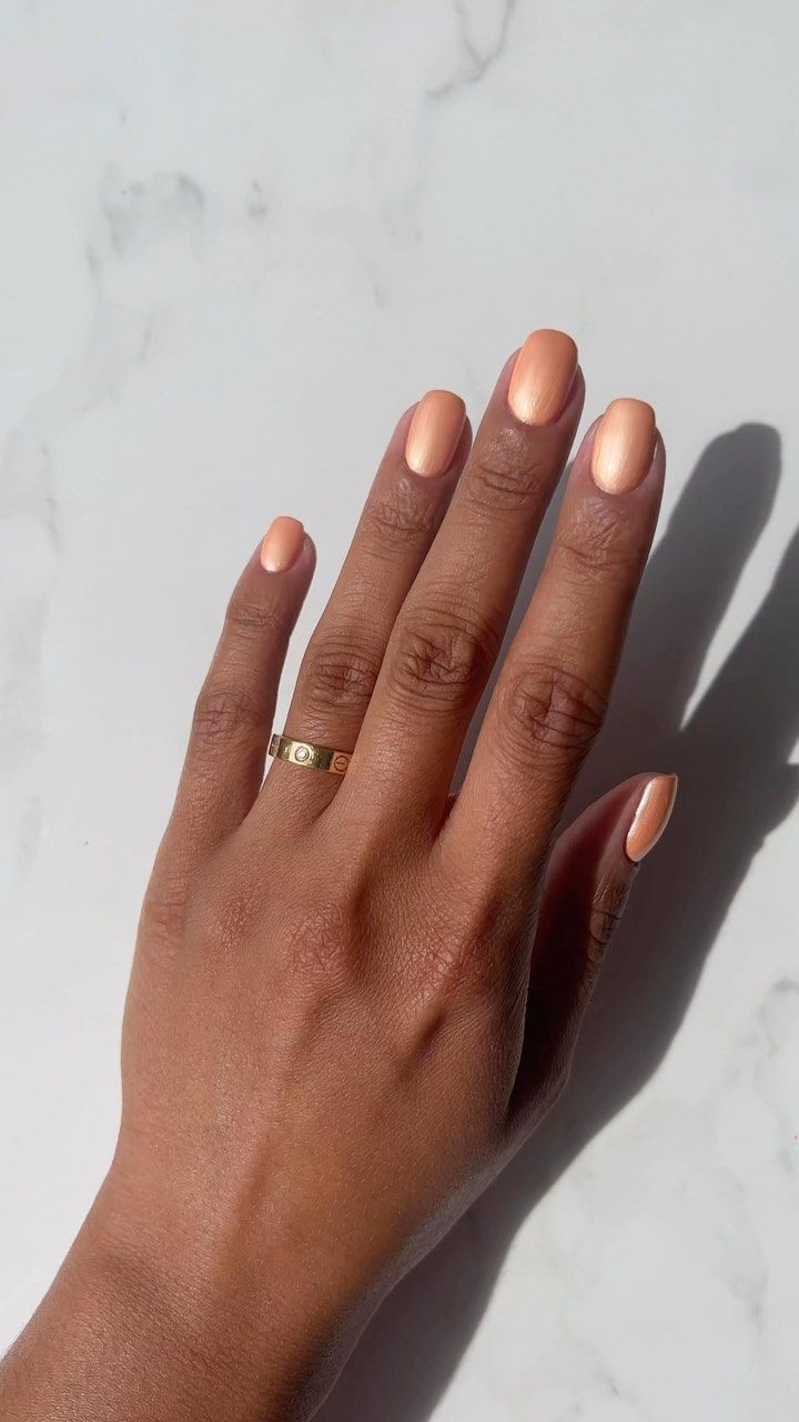 Orange chrome nails