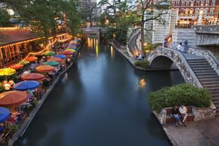 San Antonio River and River Walk at dusk