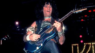 Bruce Kulick plays a blue Superstrat onstage with Kiss in 1984