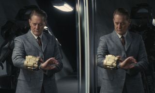 Kyle MacLachlan as Hank looking at his Pip-Boy in the Fallout show