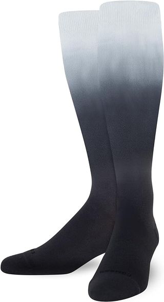 A pair of blue and white ombre Comrad compression socks