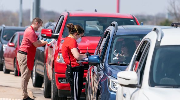 Poll workers wear masks in Sun Prairie, Wisconsin. 