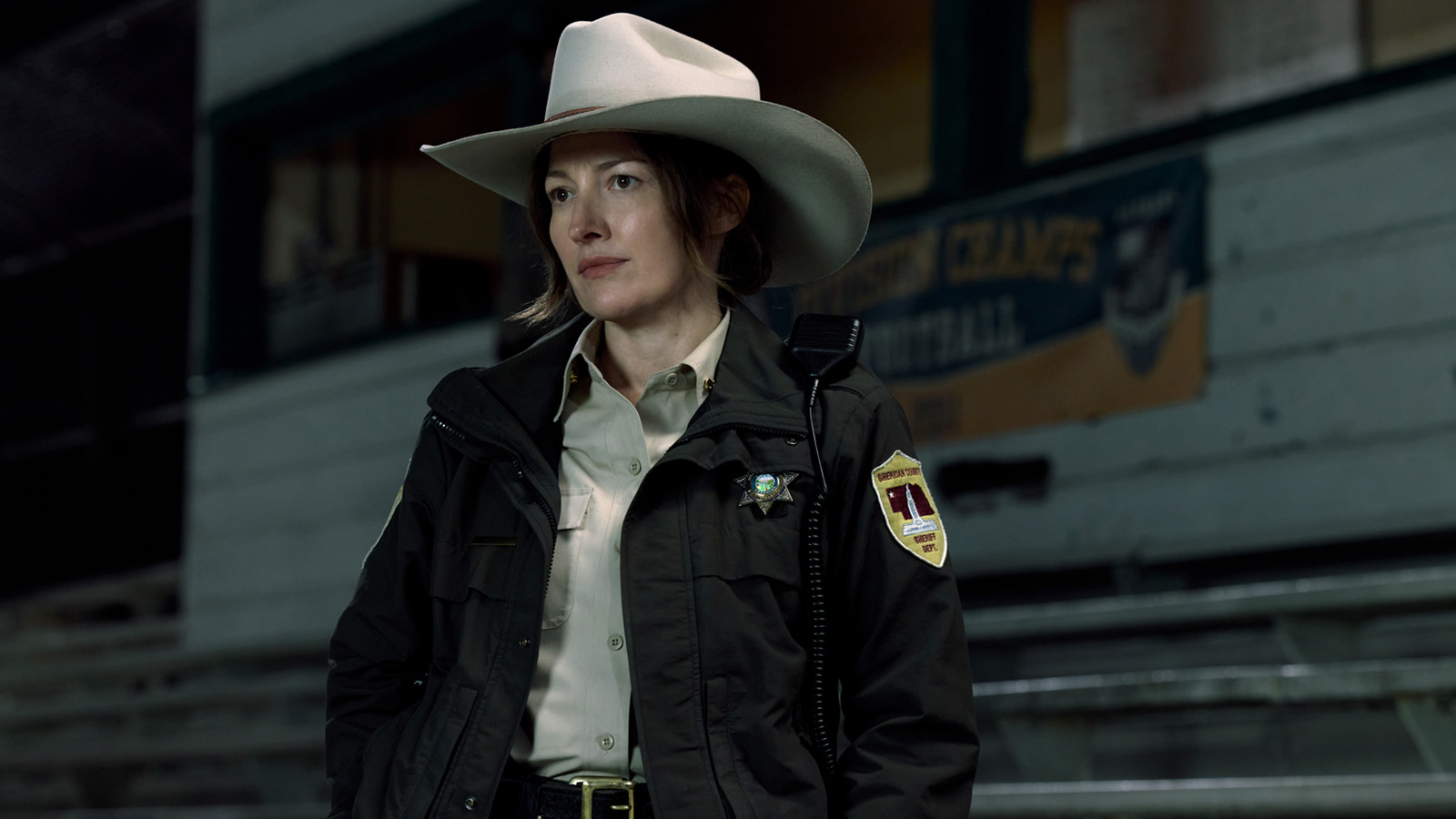 Sheriff Kerry standing at night in DC Studios' Lanterns TV series