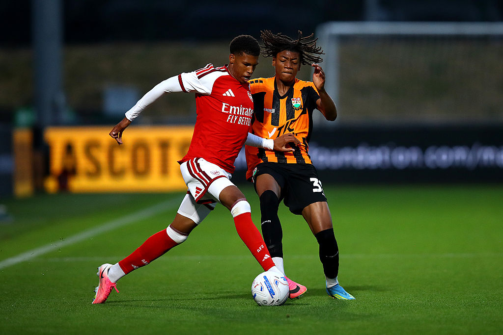 Andre Harriman-Annous of Arsenal is challenged by Aaron Liwala of Barnet during the Vertu Trophy match between Barnet and Arsenal U21 at The Hive on August 18, 2026 in Barnet, England.