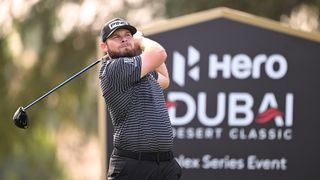 Tyrrell Hatton takes a shot at the Dubai Desert Classic