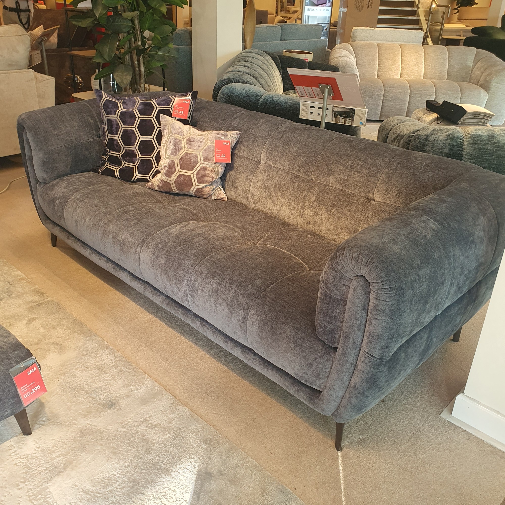 The Ideal Home Sienna sofa in grey at a Furniture Village store