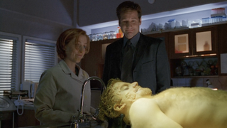 Scully and Mulder with invisible man in the "Je Souhaite" episode of The X-Files