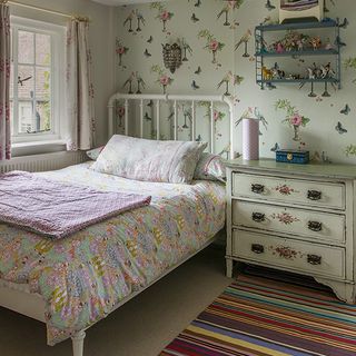 children's bedroom with bed and drawer